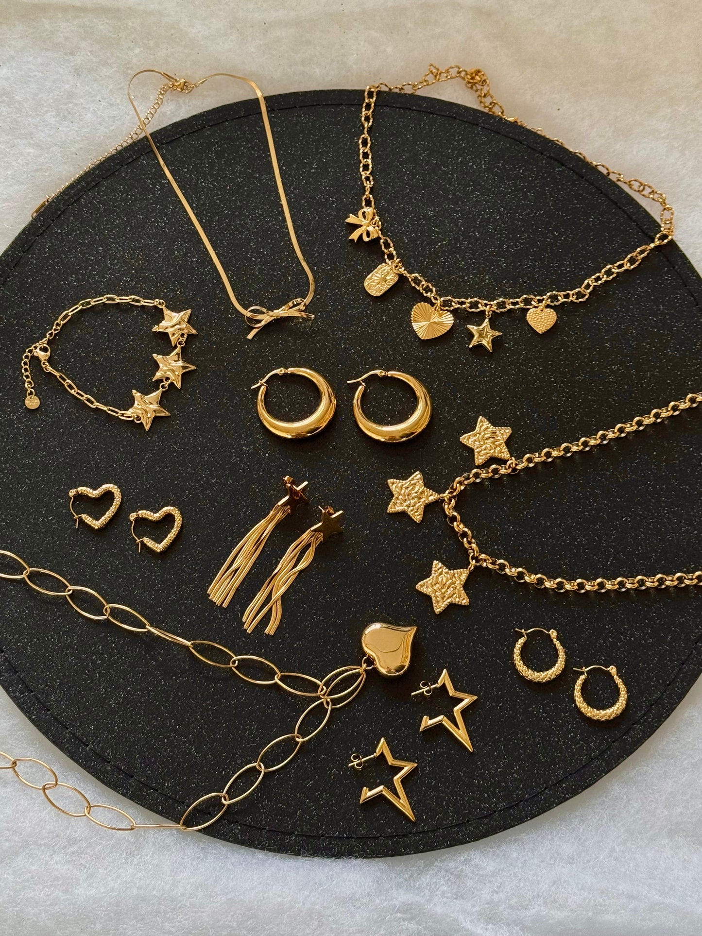 ‘FUNKY STARS’ oorbellen - goud/zilver