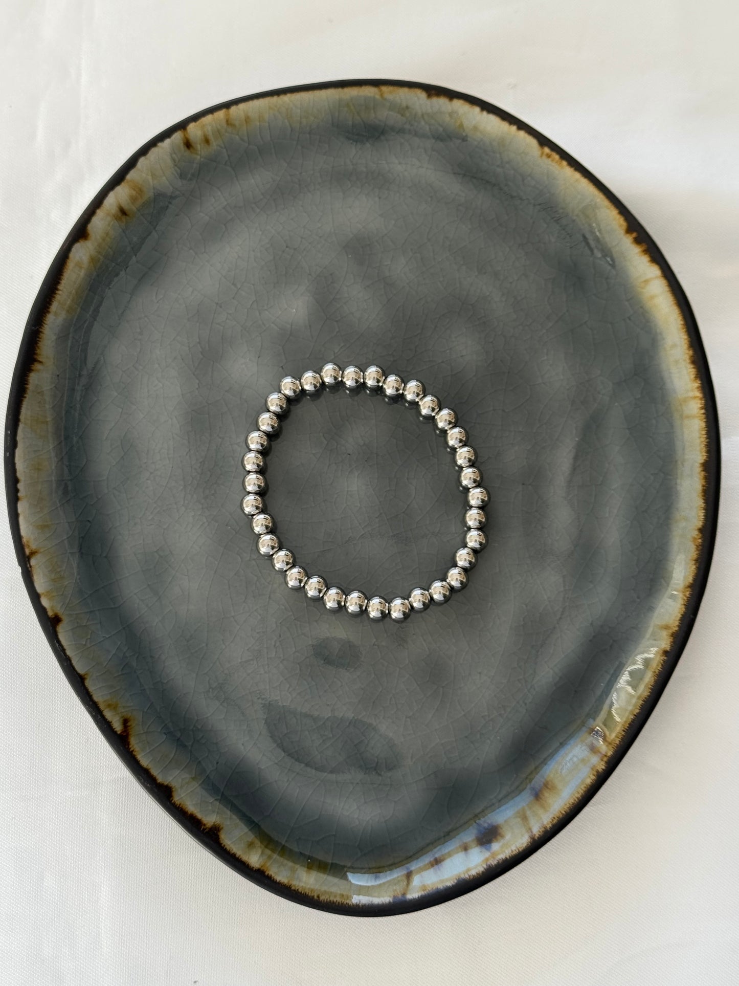 ‘CLASSY’ armband - goud/zilver
