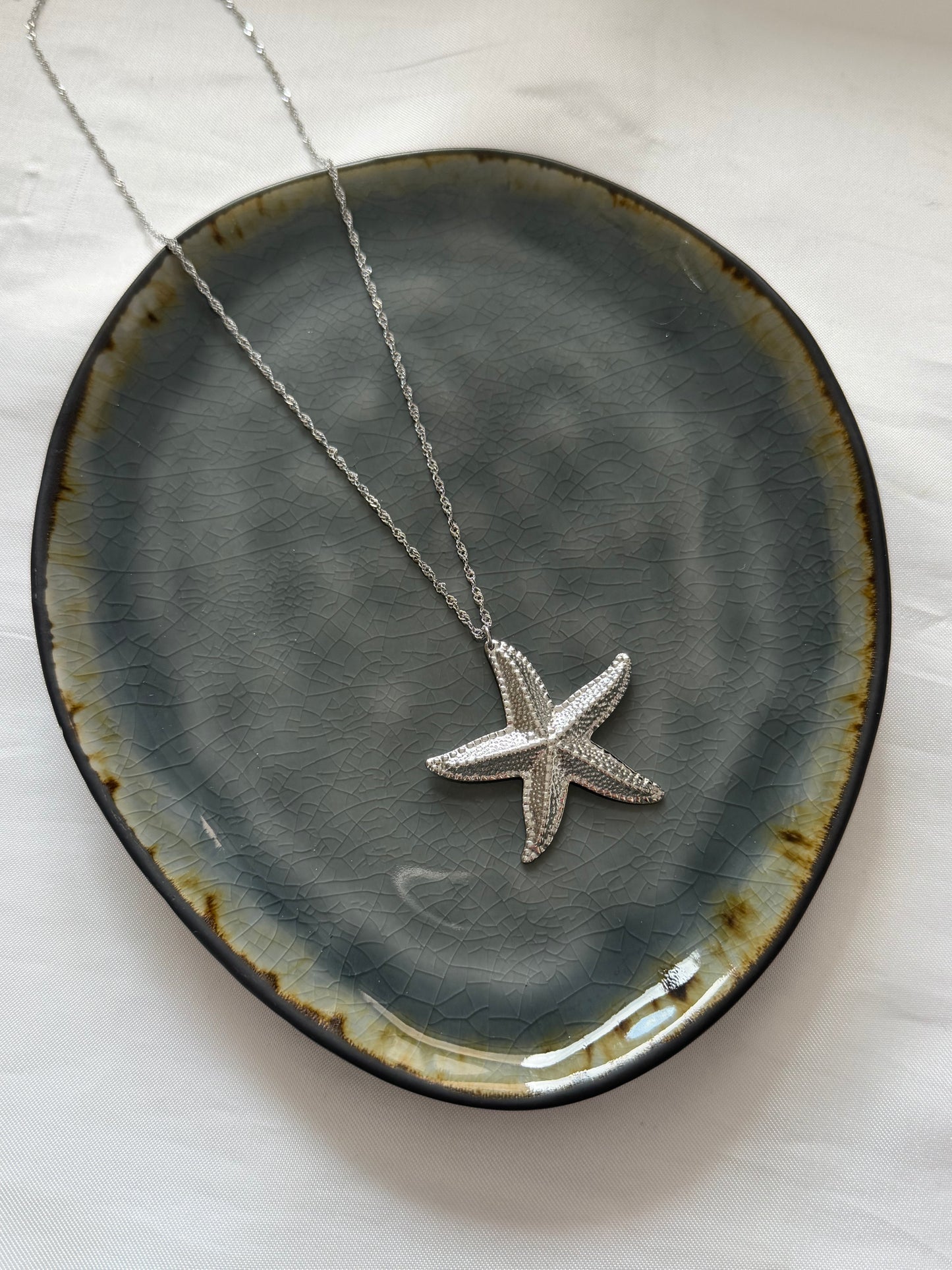 ‘STATEMENT STARFISH’ ketting - goud/zilver