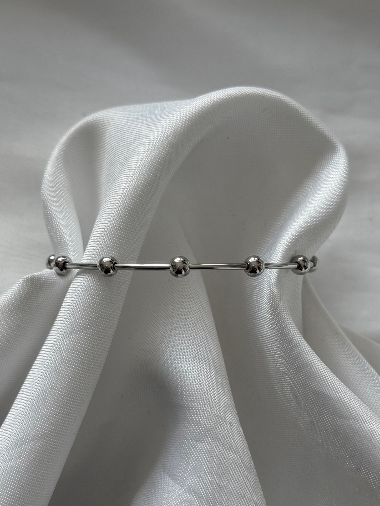 ‘LITTLE DOTS’ bangle - goud/zilver