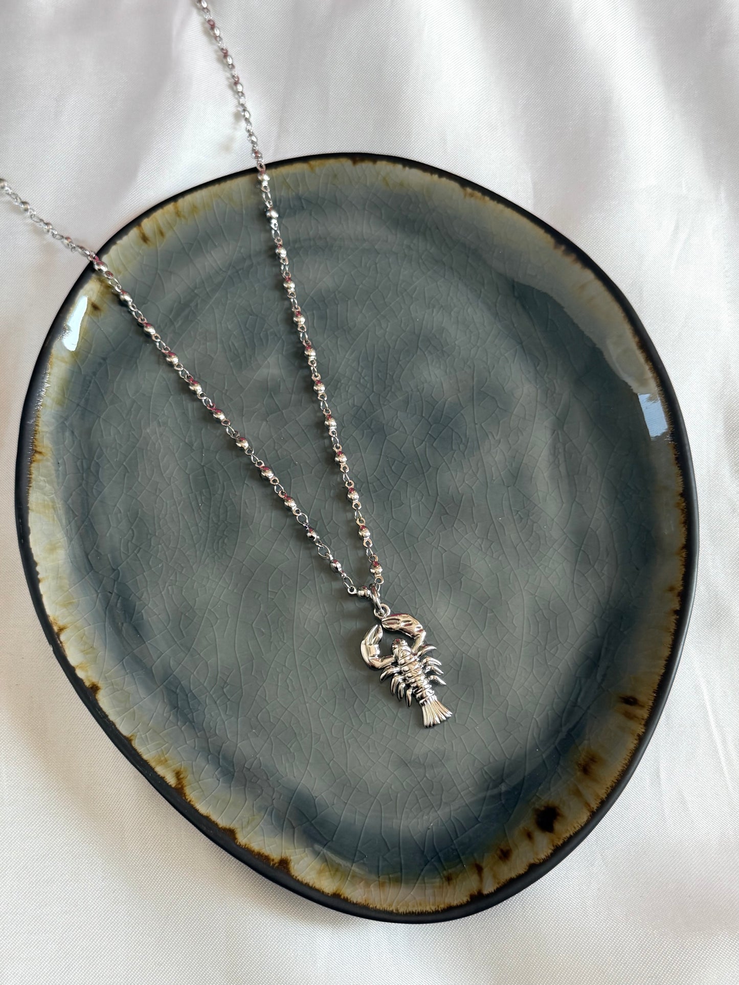 ‘LOBSTER’ ketting - goud/zilver
