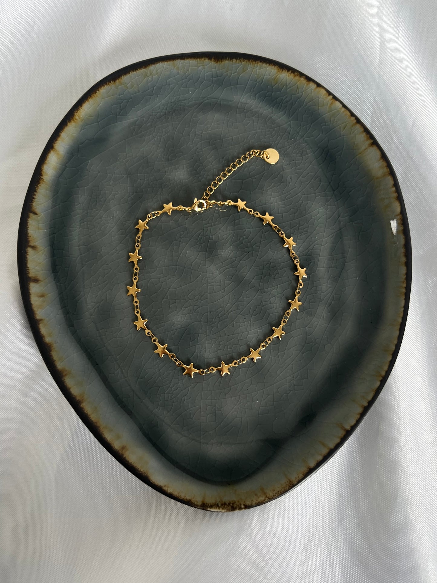 ‘STARS’ enkelbandje - goud/zilver