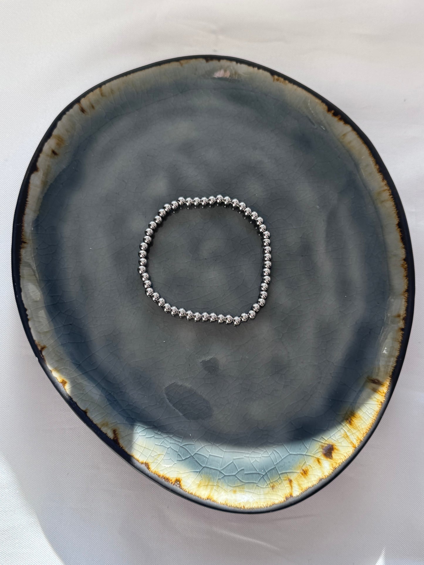 ‘SMALL CLASSY’ armband - goud/zilver