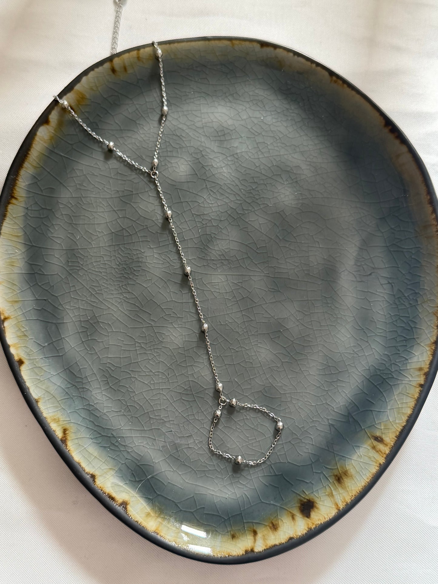 ‘DOTS’ hand chain - goud/zilver