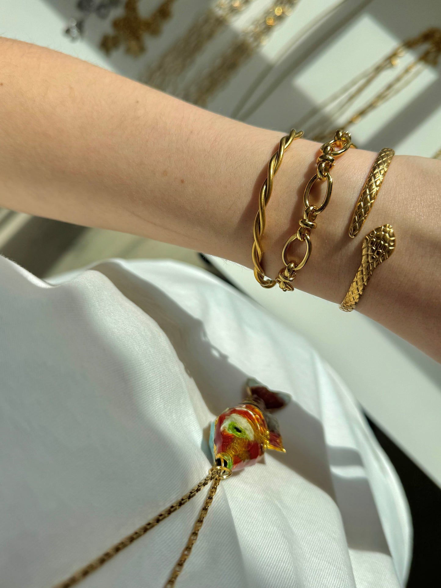 ‘TWISTED’ bangle armband - goud