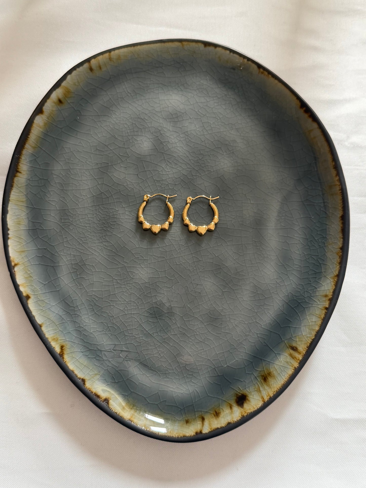 'HEARTS' oorbellen - goud/zilver