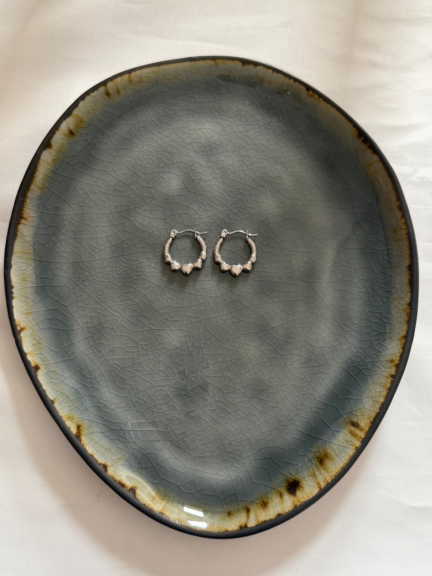 'HEARTS' oorbellen - goud/zilver