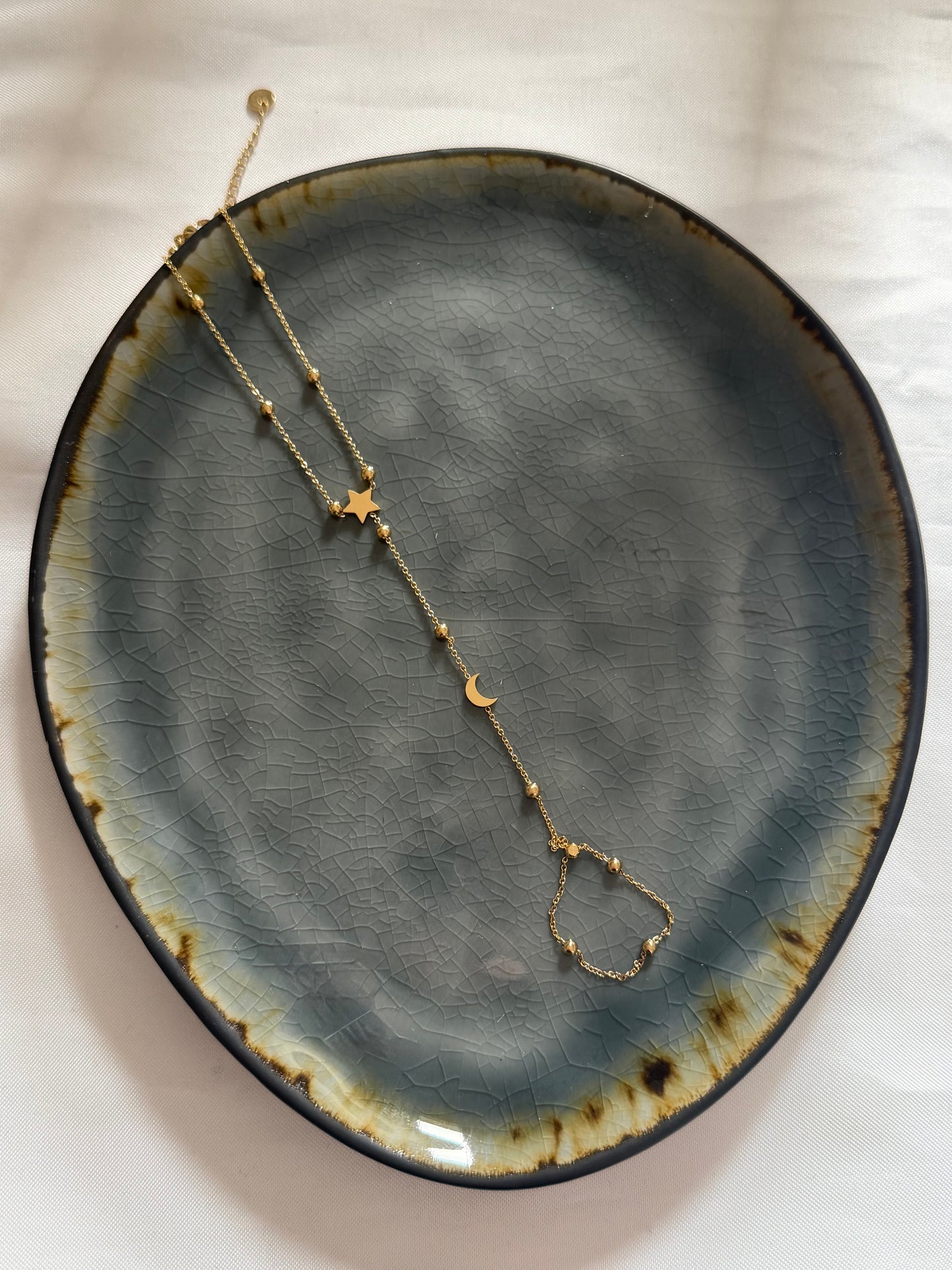 ‘MOONLIGHT’ hand chain - goud/zilver