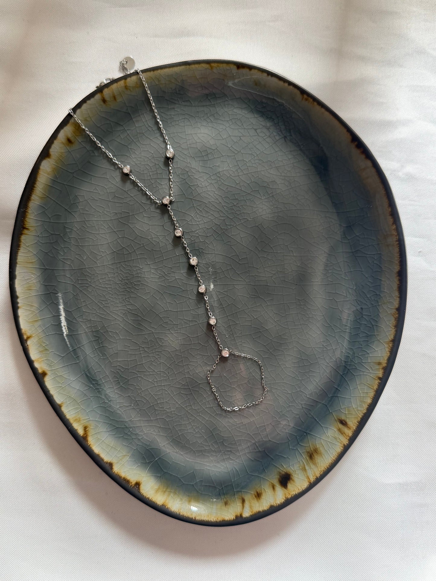 ‘SPARKLES’ hand chain - goud/zilver