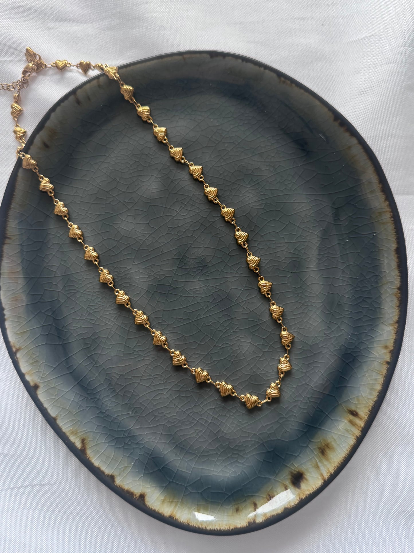 ‘TWISTED LOVE’ ketting - goud