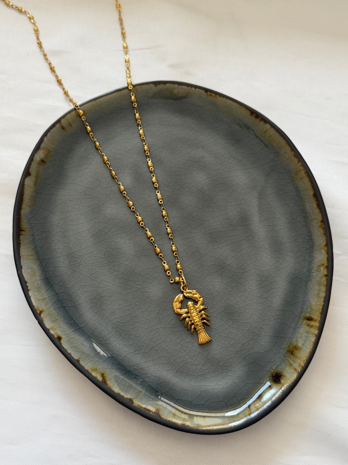 ‘LOBSTER’ ketting - goud/zilver