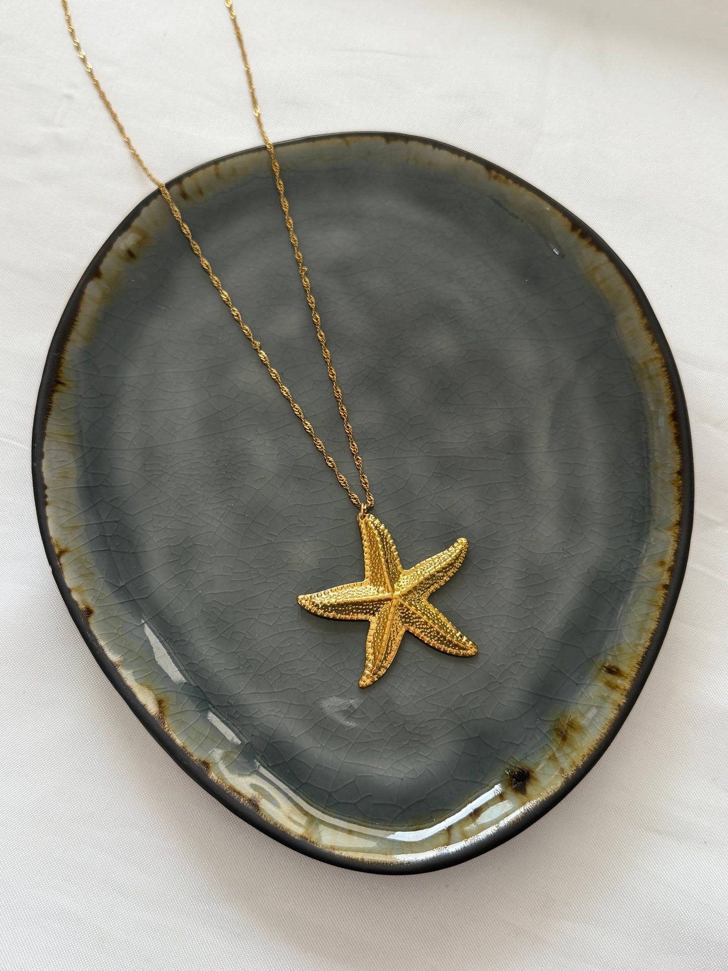 ‘STATEMENT STARFISH’ ketting - goud/zilver
