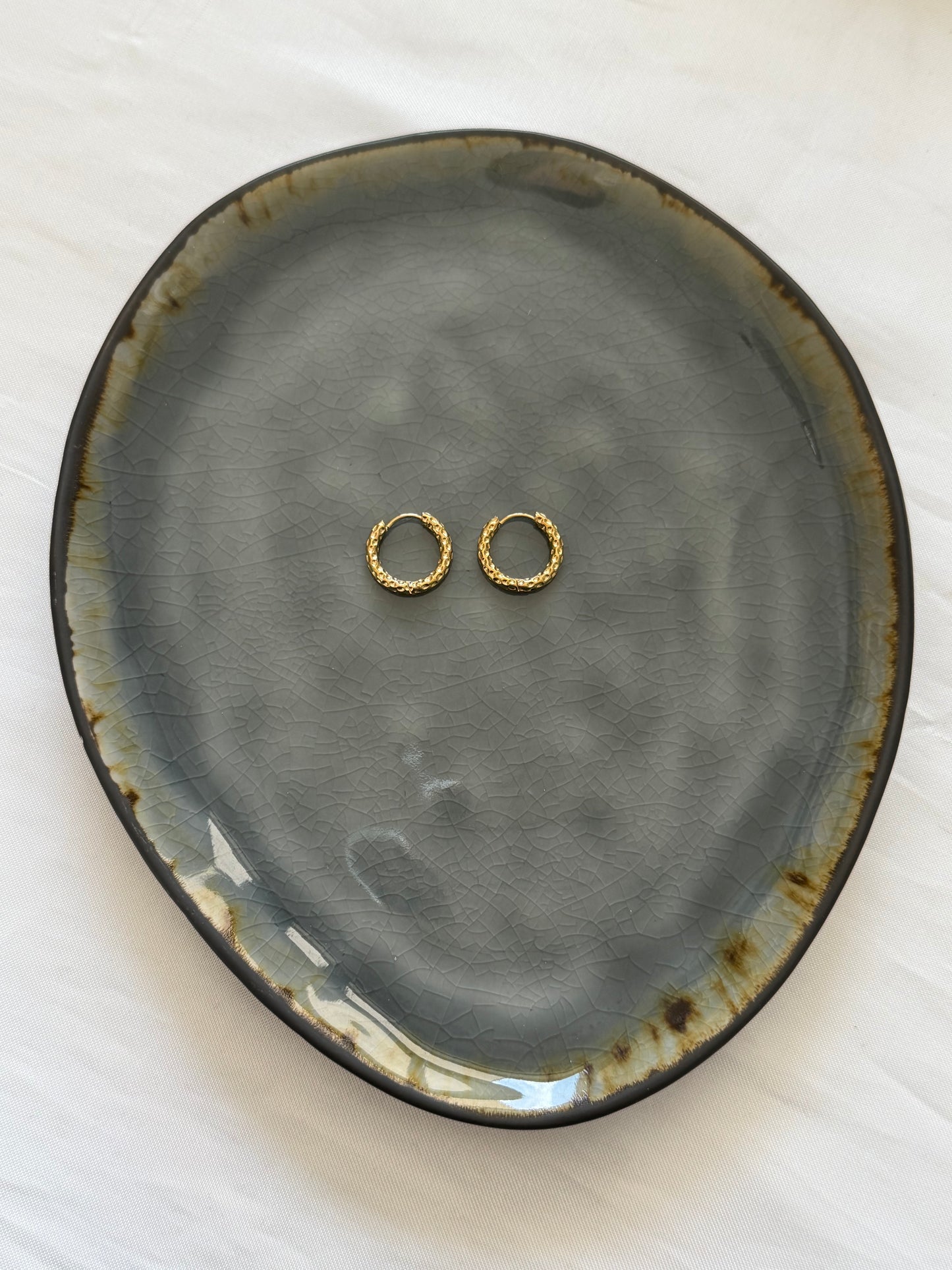 ‘XOXO’ oorbellen - goud/zilver