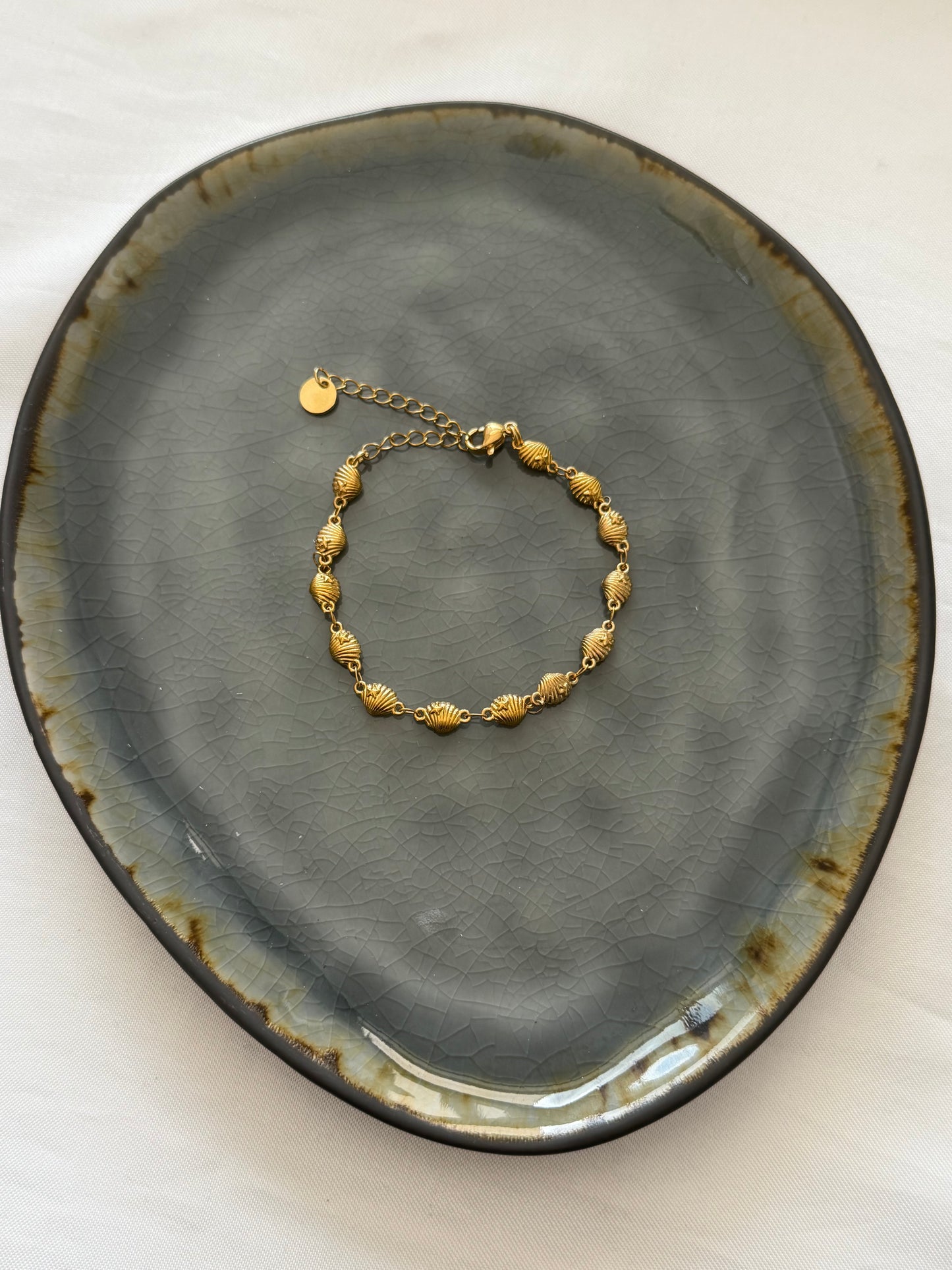 ‘LITTLE SHELLS’ armband - goud
