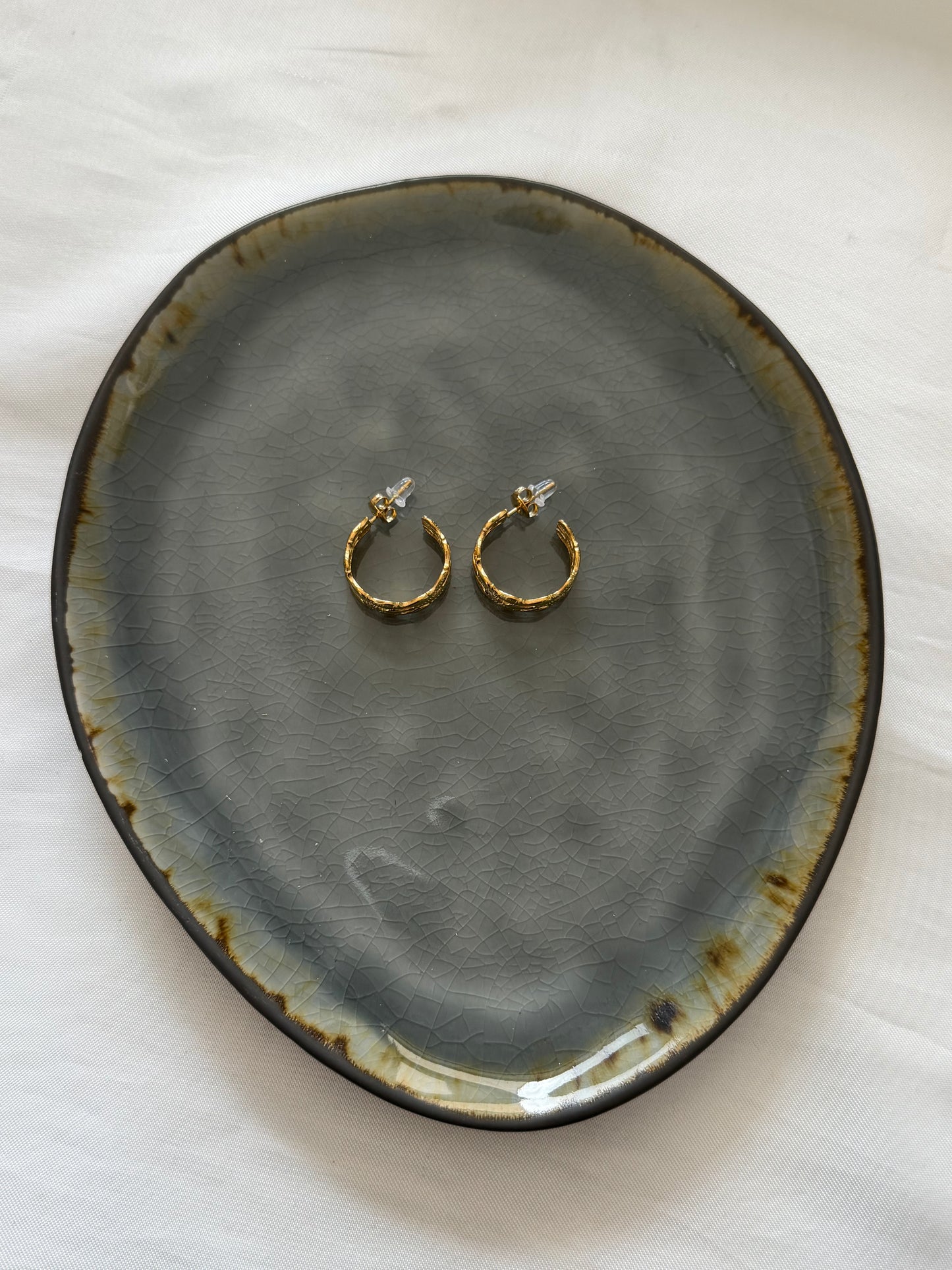 ‘SWIMMING FISH’ oorbellen - goud