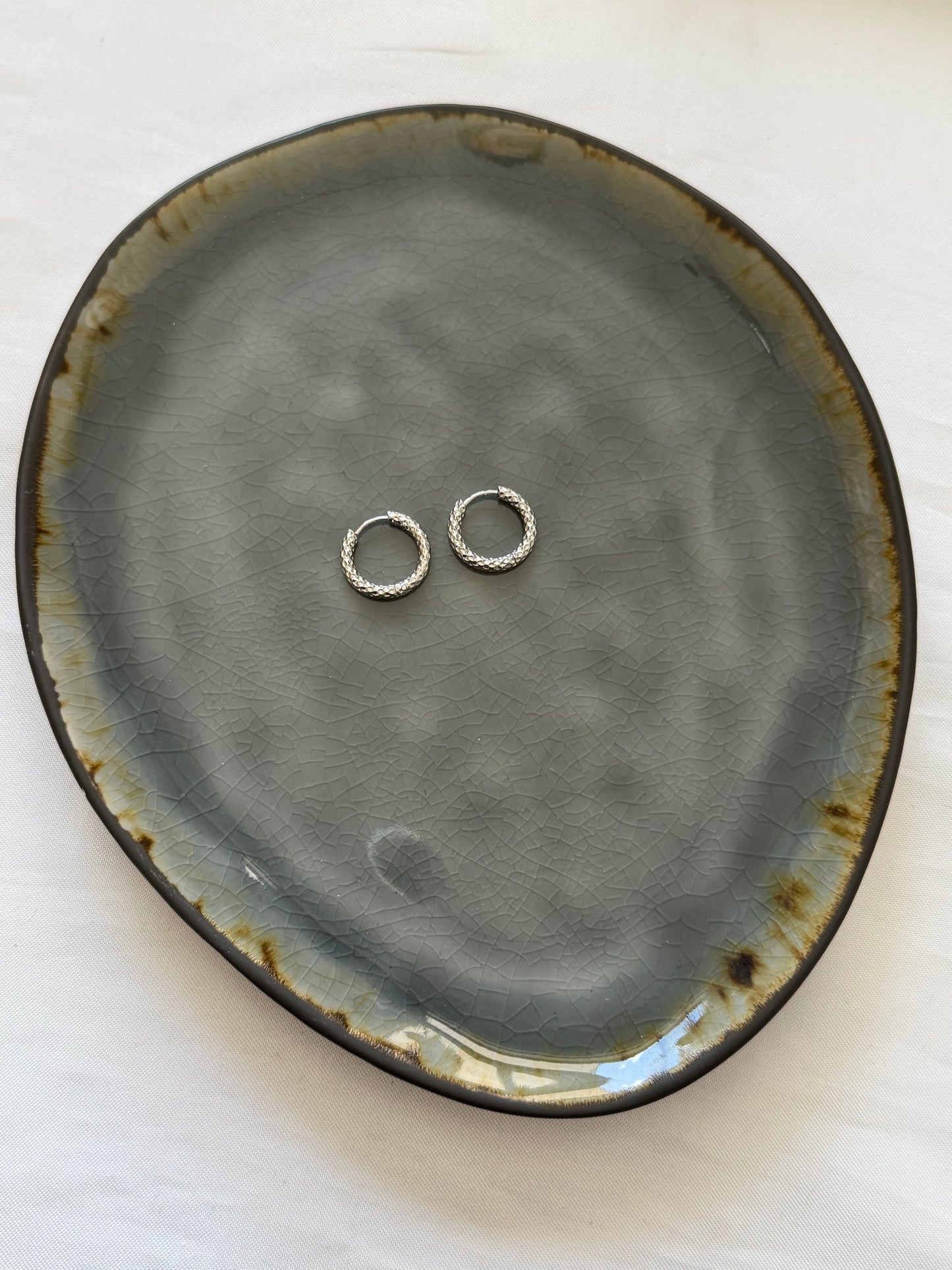 ‘XOXO’ oorbellen - goud/zilver