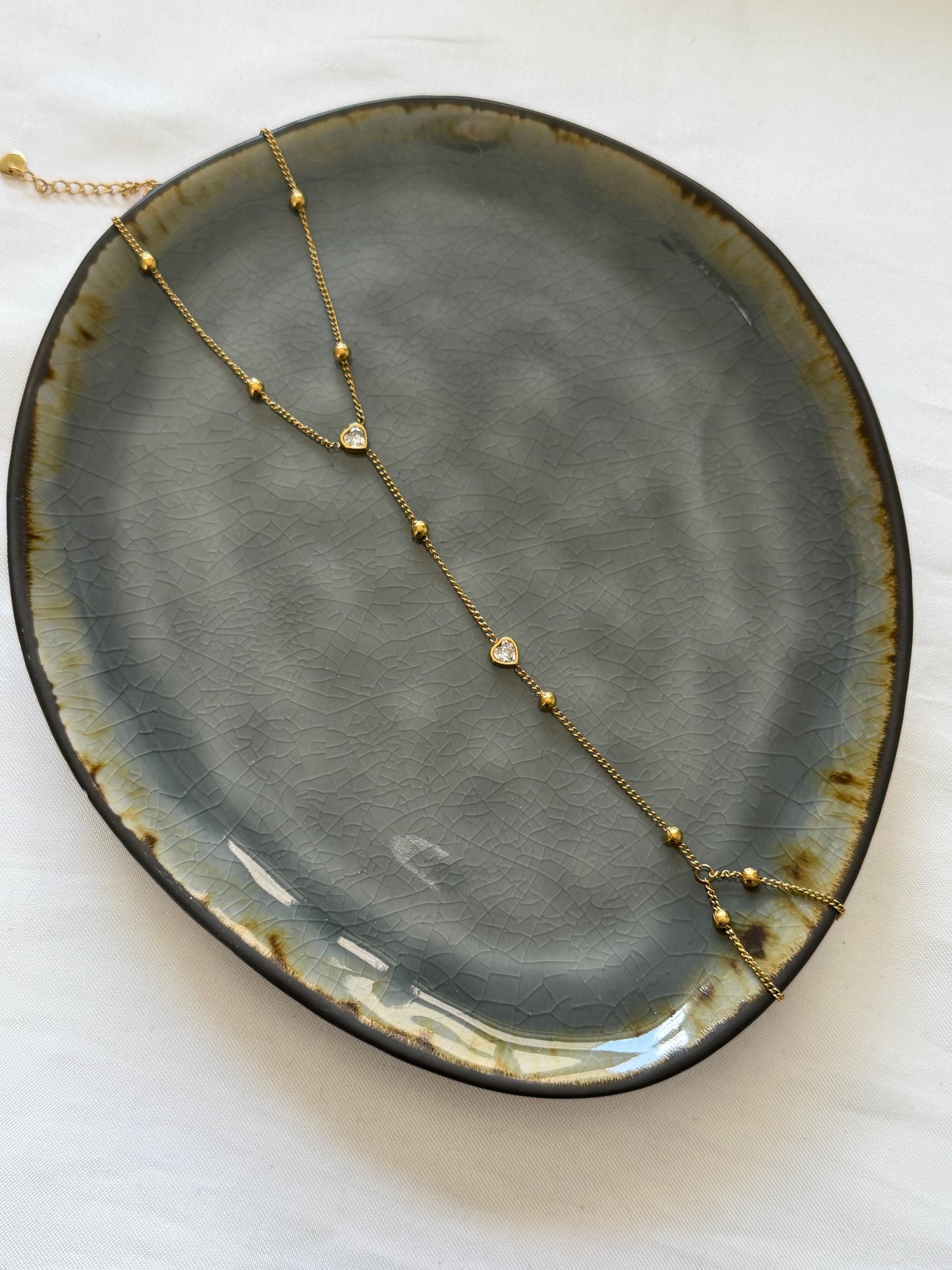 ‘LOVELY’ hand chain - goud/zilver