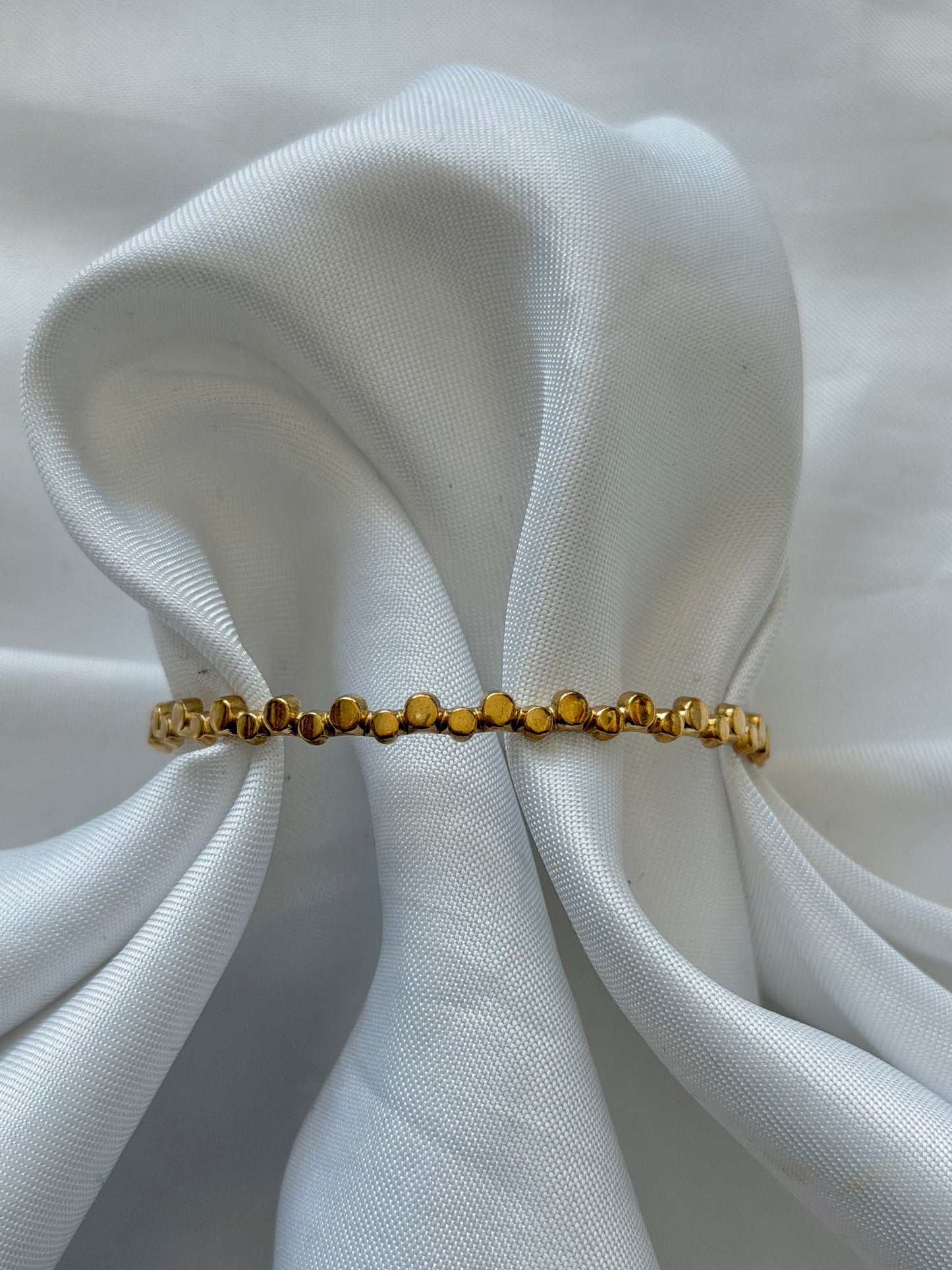 ‘WAVY DOTS’ bangle - goud/zilver
