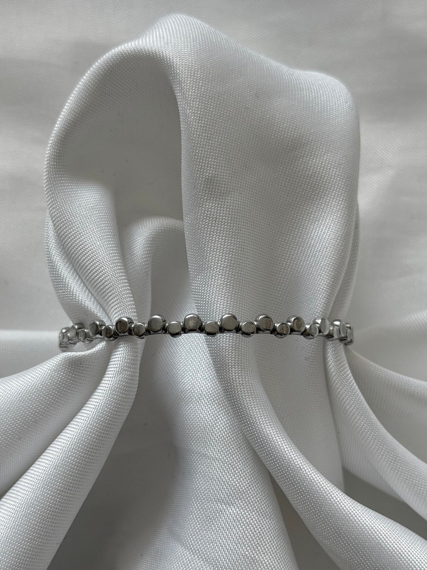 ‘WAVY DOTS’ bangle - goud/zilver