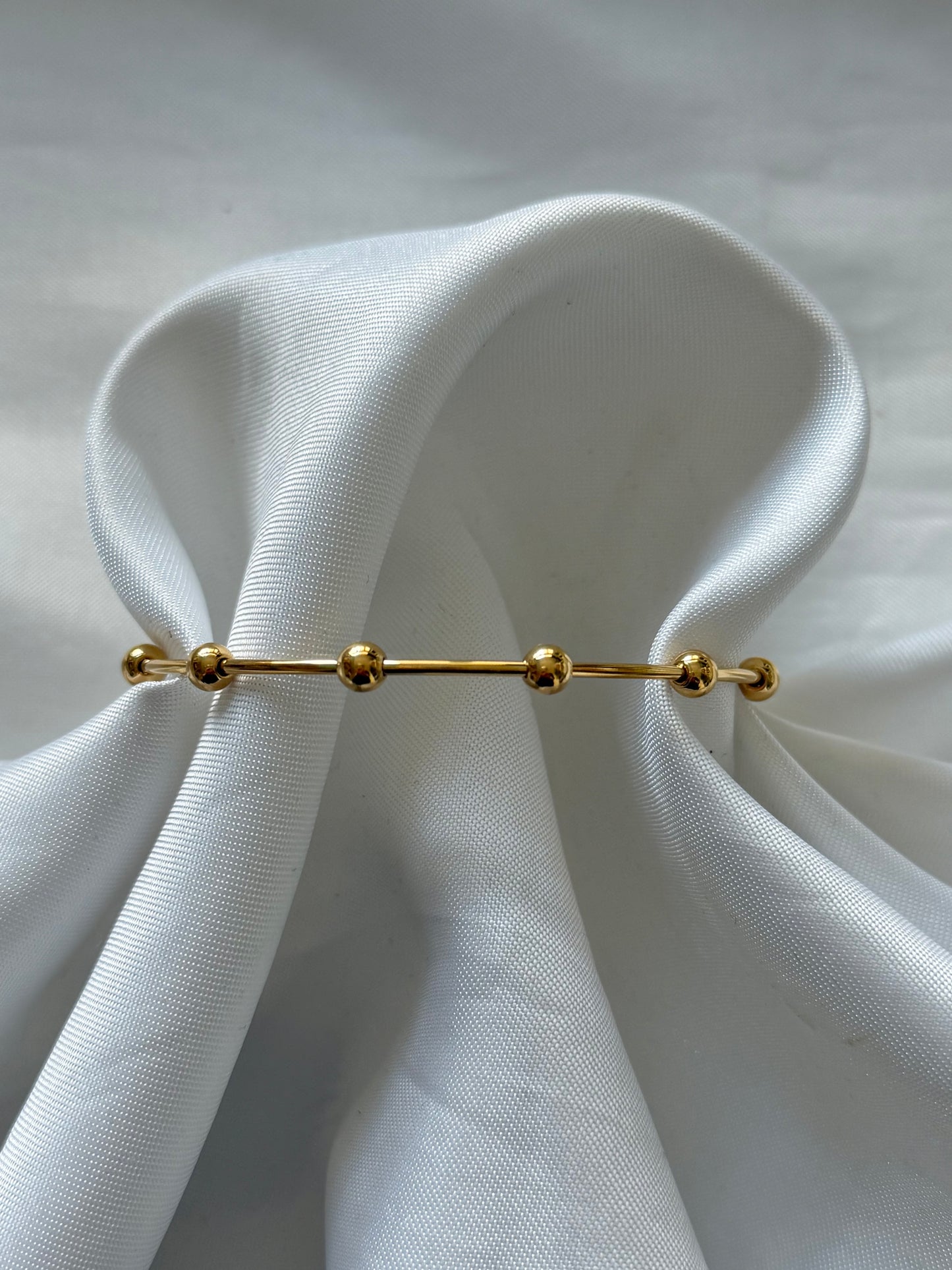 ‘LITTLE DOTS’ bangle - goud/zilver