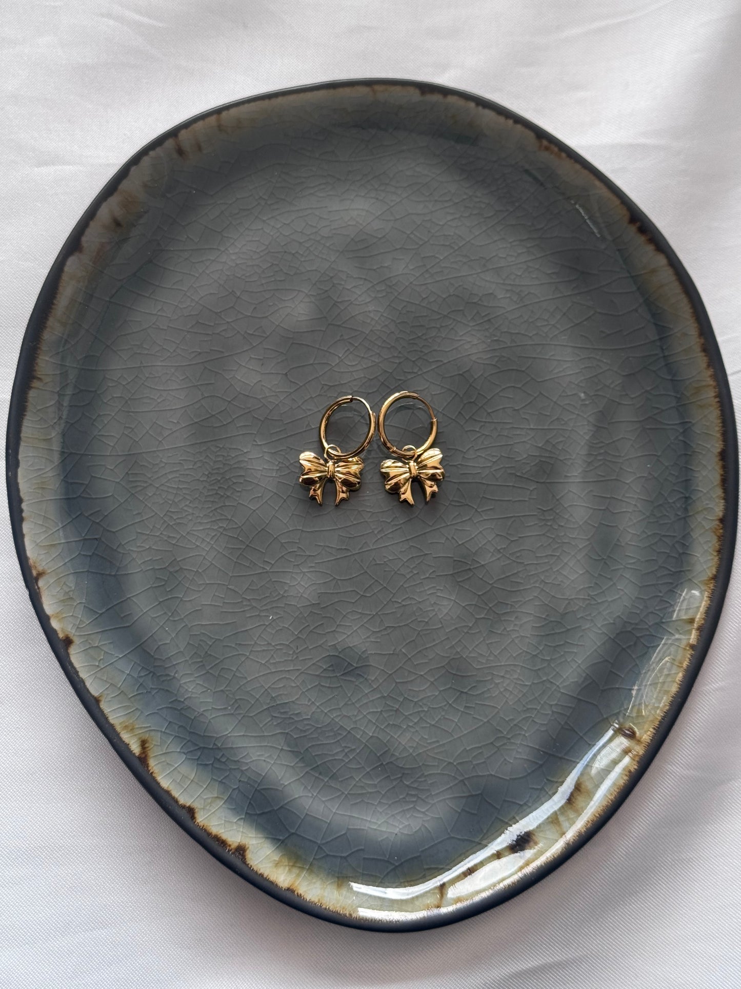 ‘LITTLE BOW’ oorbellen - goud