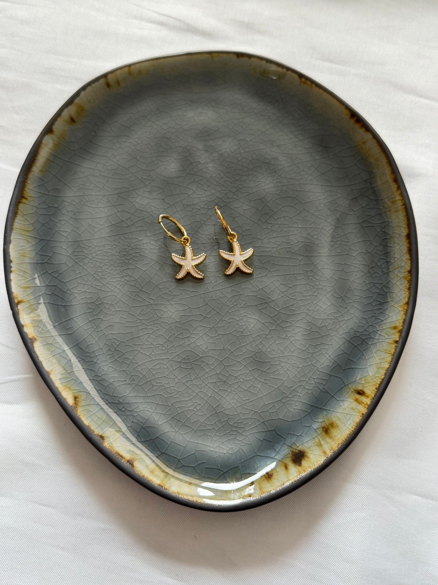 ‘WHITE STARFISH’ oorbellen - goud