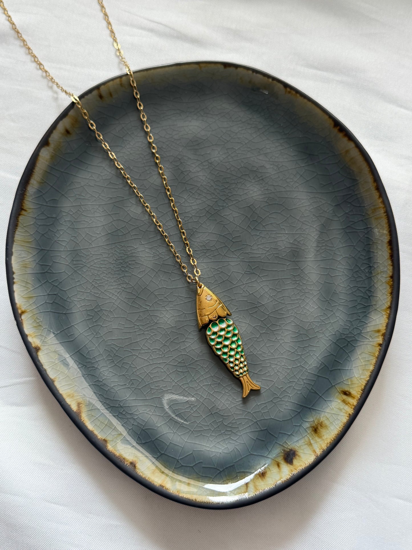 ‘GREEN FISH’ ketting - goud