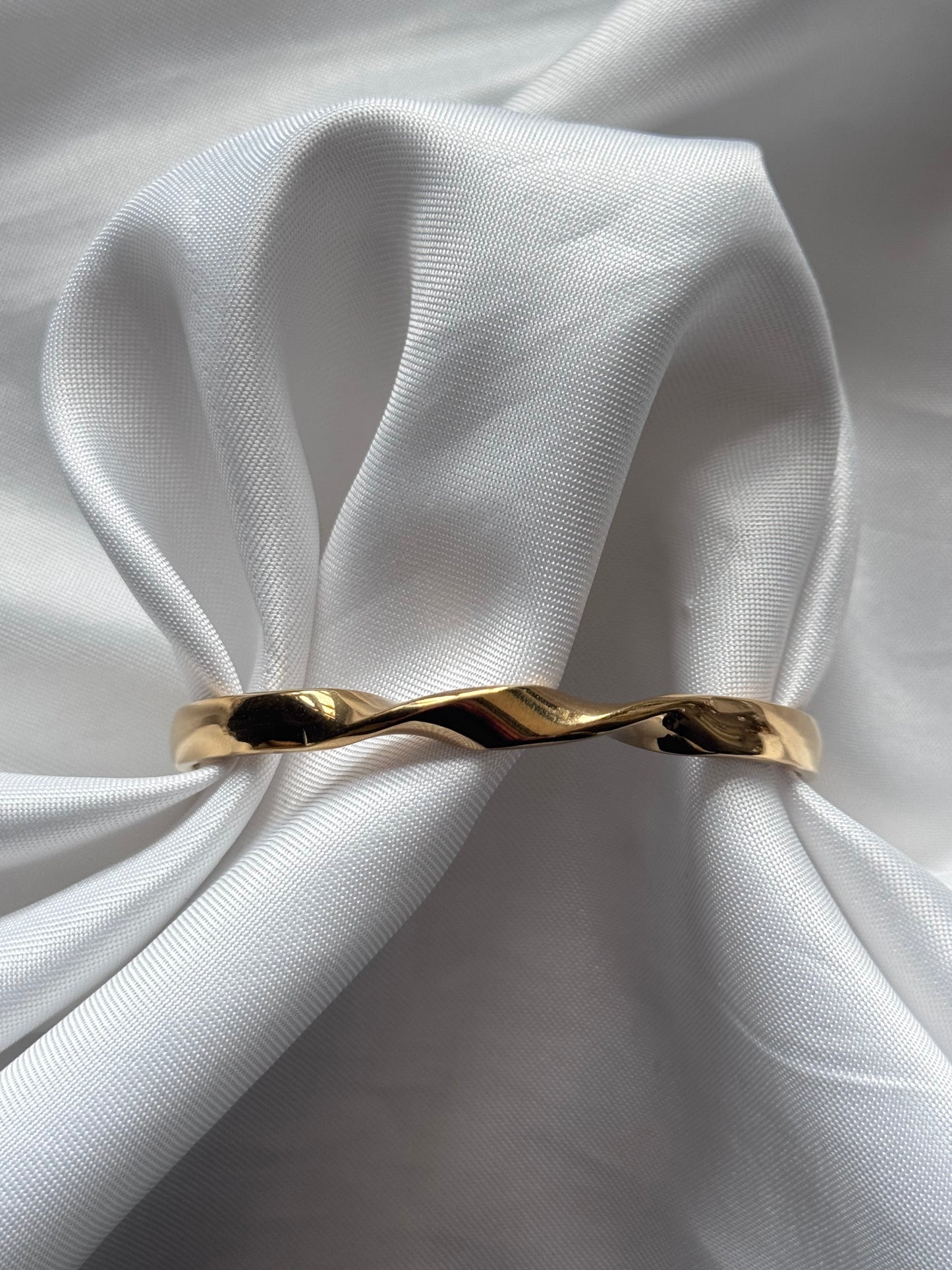 ‘TWISTER’ bangle - goud/zilver